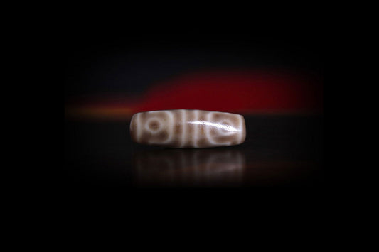 Four Eye Dzi Bead Properties, Meanings and Powers - Mantrapiece