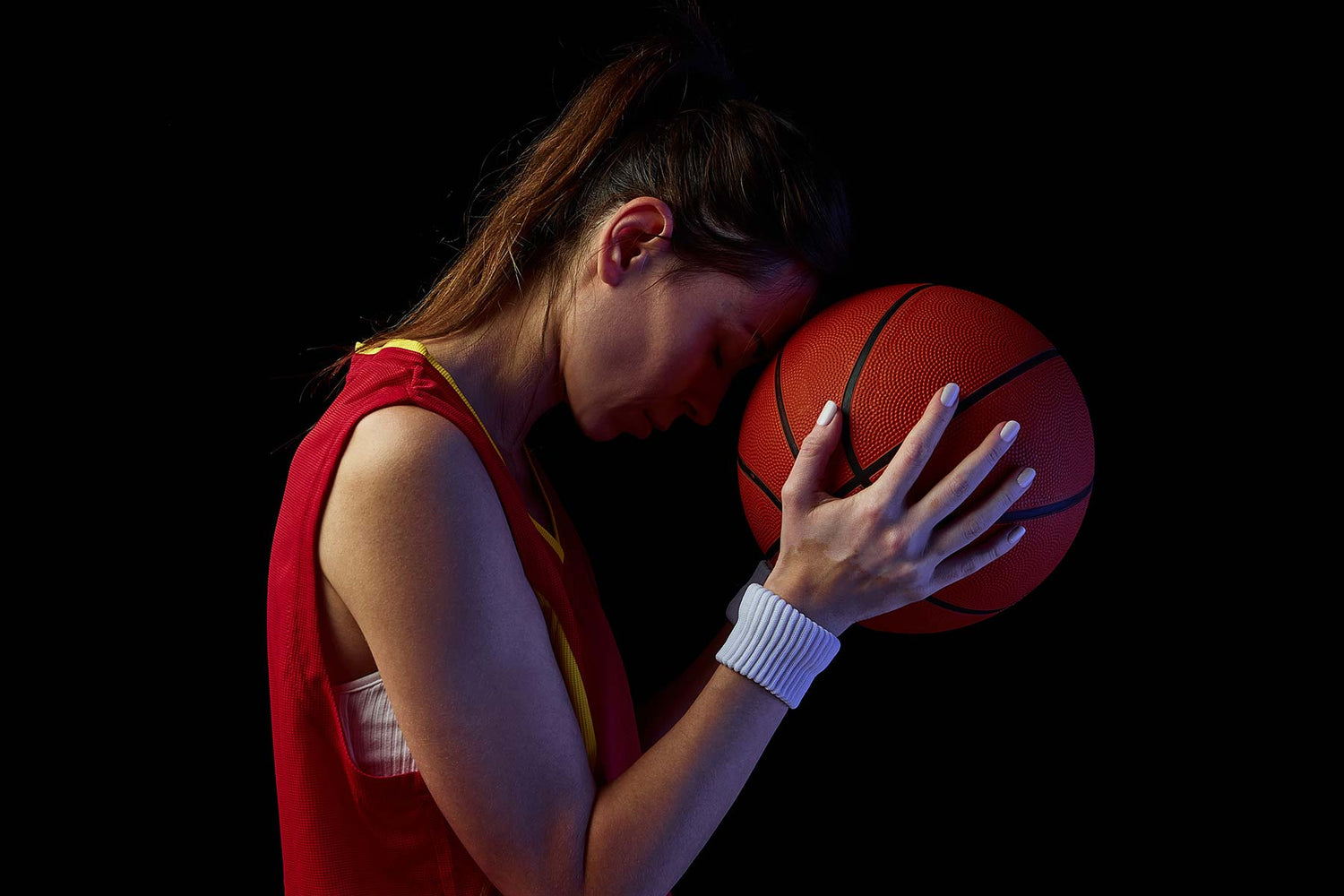 Basketball player mindfully focusing before taking the shot.
