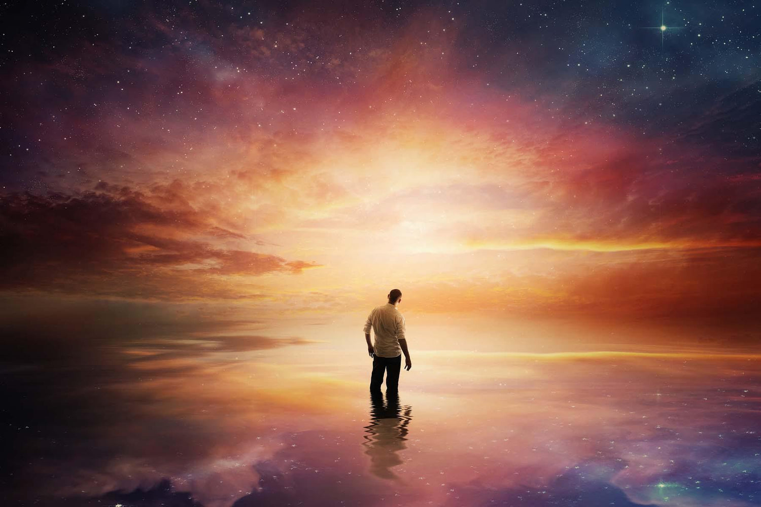 Man standing on a reflective surface beneath a cosmic sky, representing a spiritual awakening story and the journey into higher awareness