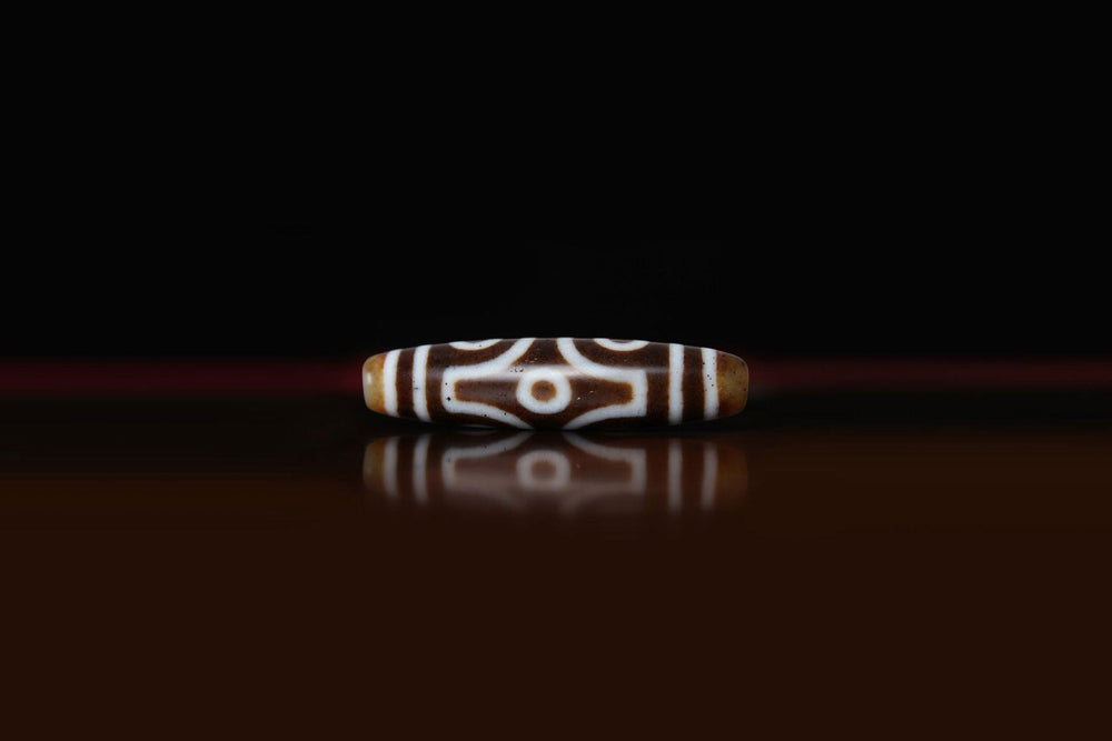 Six Eye Dzi Bead Properties, Meanings and Powers - Mantrapiece