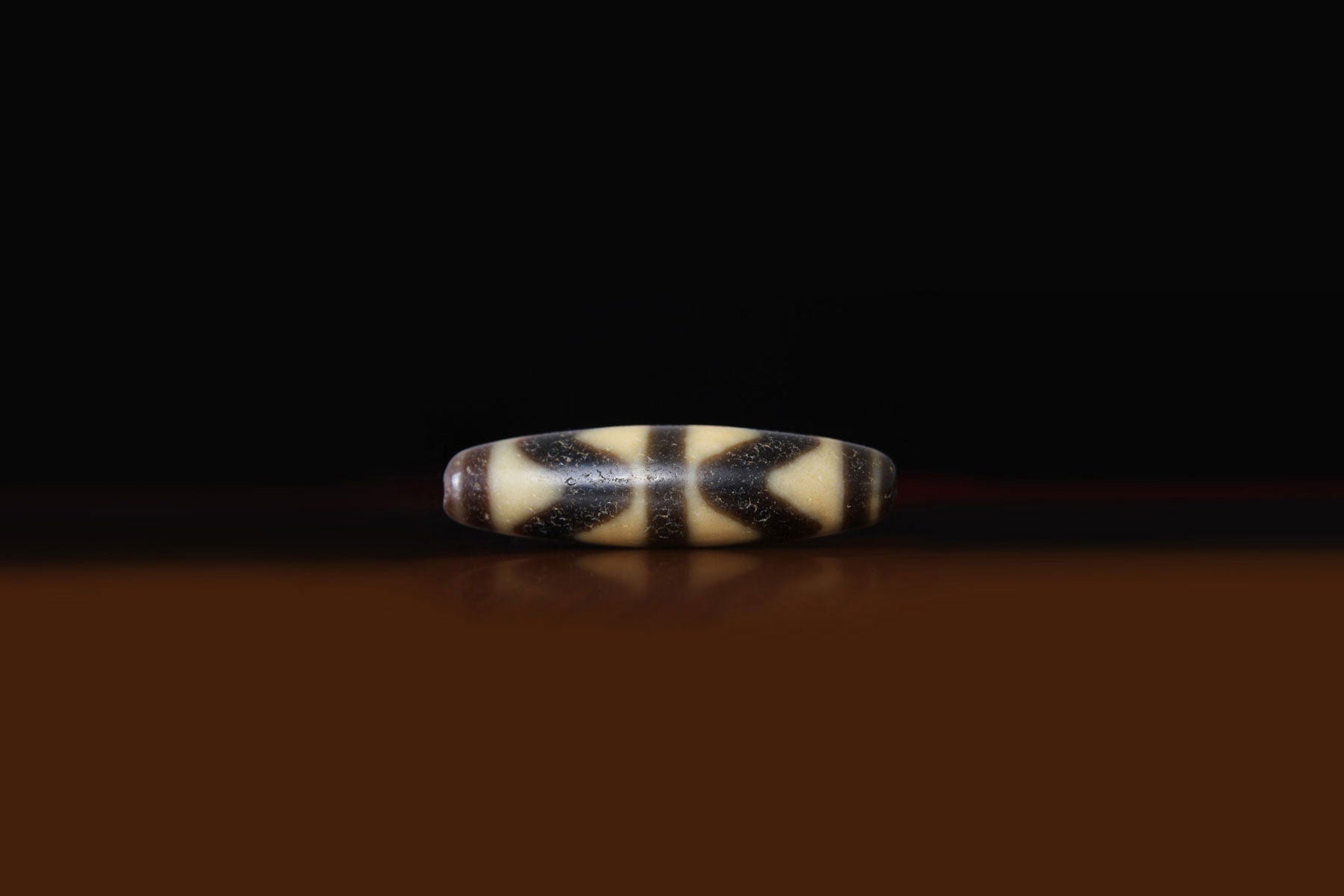 Tiger Teeth Dzi Bead Properties, Meanings and Powers