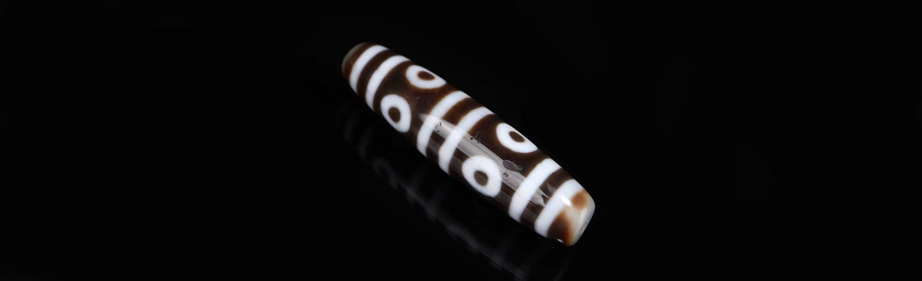 8 Eye Dzi: Tibetan Beads of Eight Blessings - Mantrapiece.com