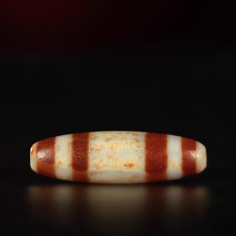 Crimson Waves Chund Dzi Bead