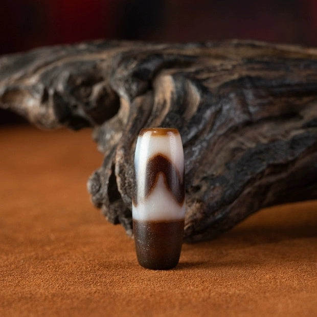 Amulet of Grounding Stability Tiger Tooth Dzi Bead