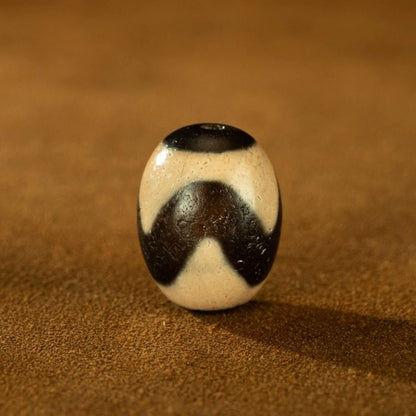 Harrowing Might Tiger Tooth Dzi Bead