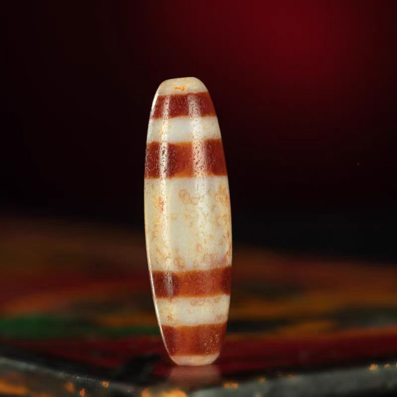Crimson Waves Chund Dzi Bead