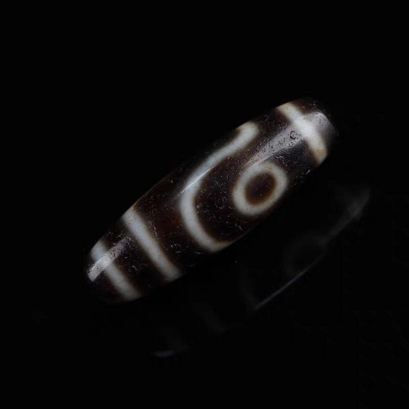 Perfecting Twofold Merit Talisman 2 Eye Dzi Bead