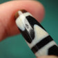Vitality Rising Tiger Tooth Dzi Bead