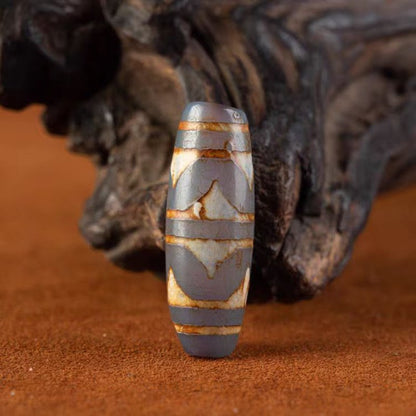 Amulet of Silent Fortitude Tiger Tooth Dzi Bead