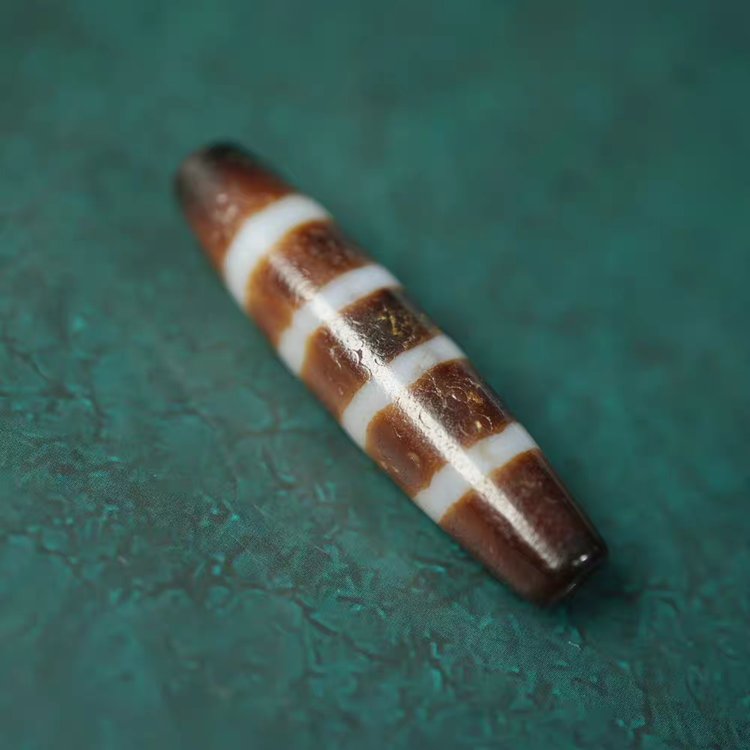 Crimson Waves Chund Dzi Bead