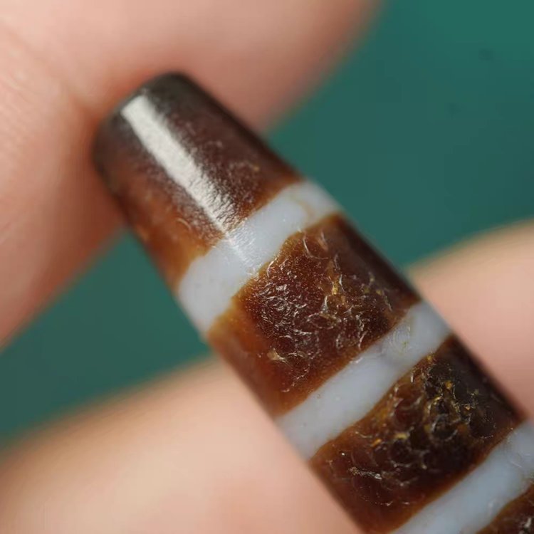 Crimson Waves Chund Dzi Bead