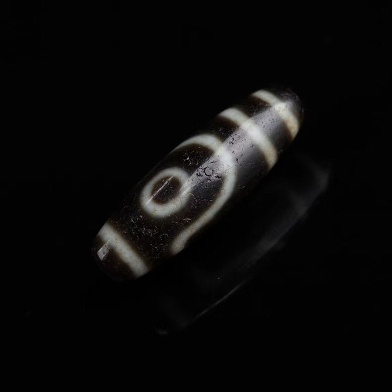 Perfecting Twofold Merit Talisman 2 Eye Dzi Bead