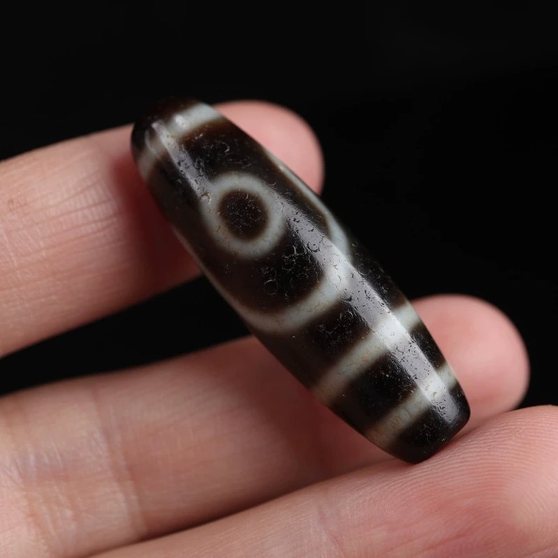 Perfecting Twofold Merit Talisman 2 Eye Dzi Bead