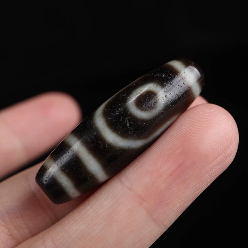 Perfecting Twofold Merit Talisman 2 Eye Dzi Bead