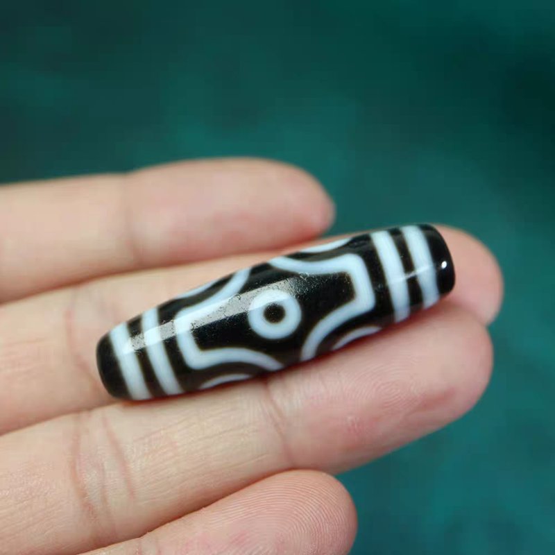 Harmonizing Body, Speech and Mind Amulet 6 Eye Dzi Bead