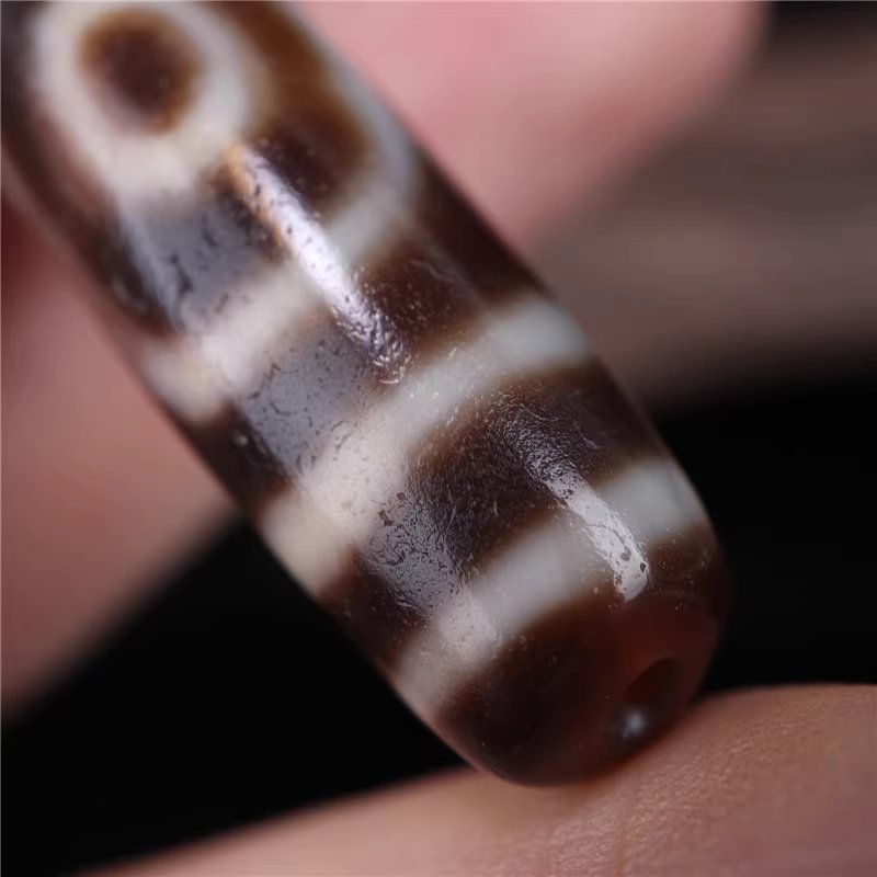 Embodiment of Harmony Amulet 2 Eye Dzi Bead