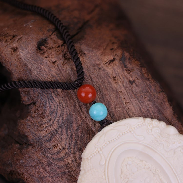 Ivory Demon Buddha Pendant