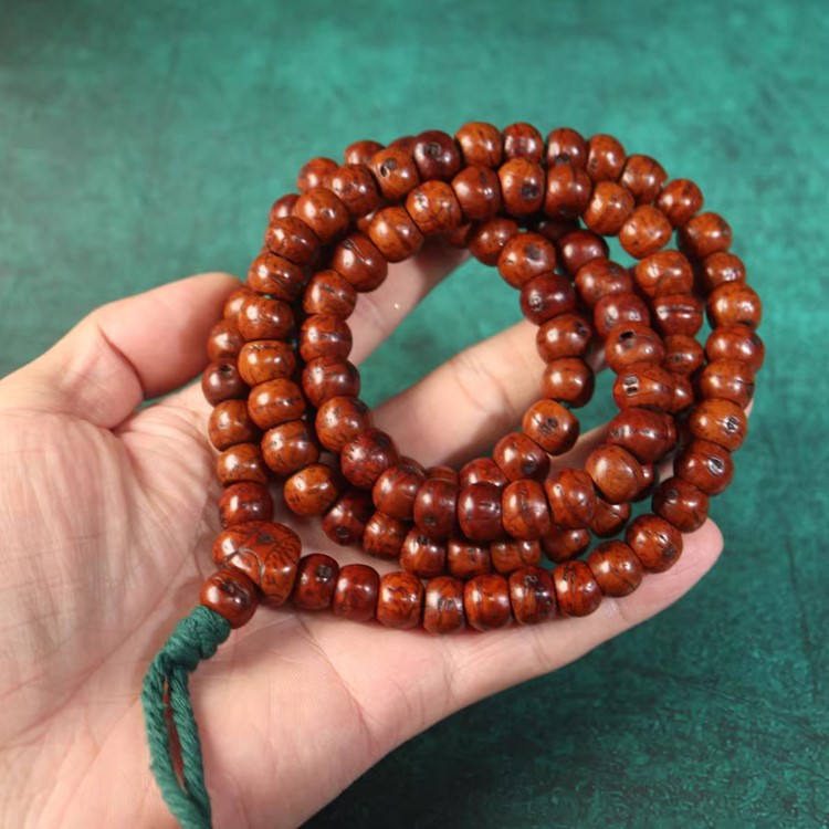 Unpolished Bodhi Seed Mala with red cord