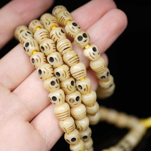 Tibetan Skull Beads: Hand-Carved Tibetan Yak Bone - Mantrapiece.com