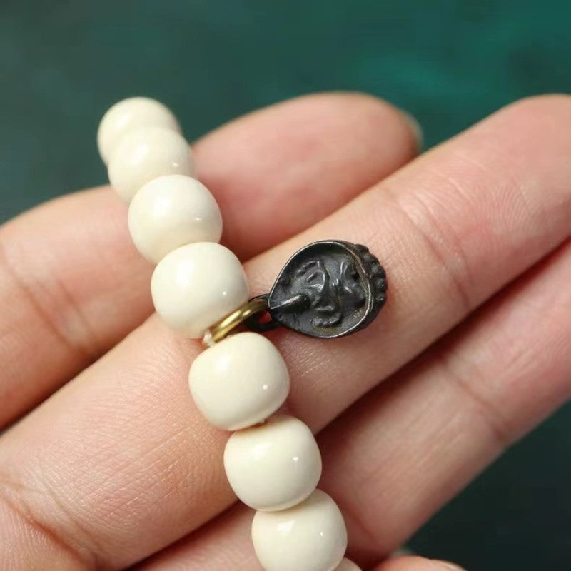 Vintage Tibetan Kuan Yin Charm