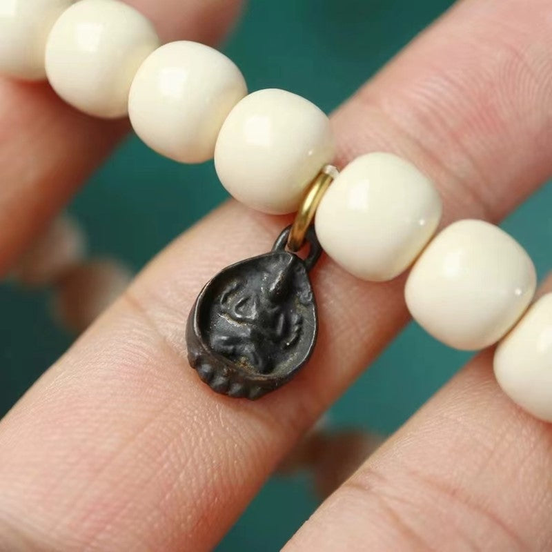 Vintage Tibetan Kuan Yin Charm