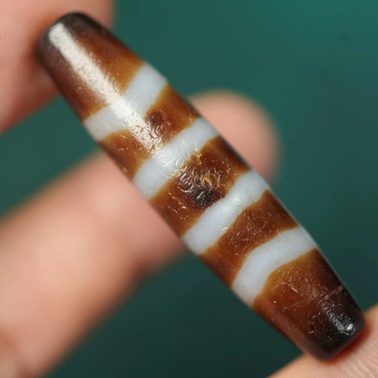 Crimson Waves Chund Dzi Bead