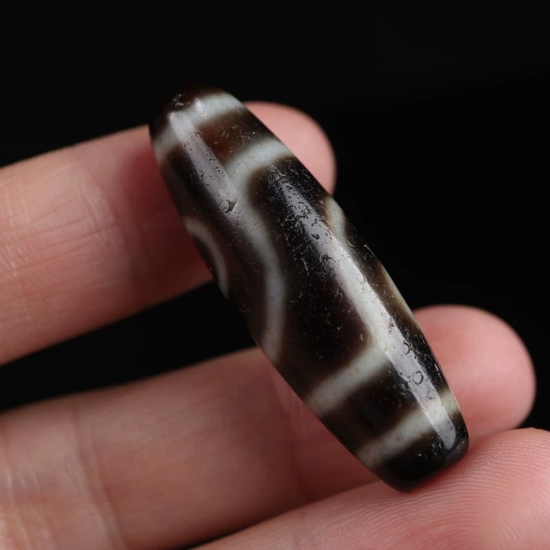 Perfecting Twofold Merit Talisman 2 Eye Dzi Bead