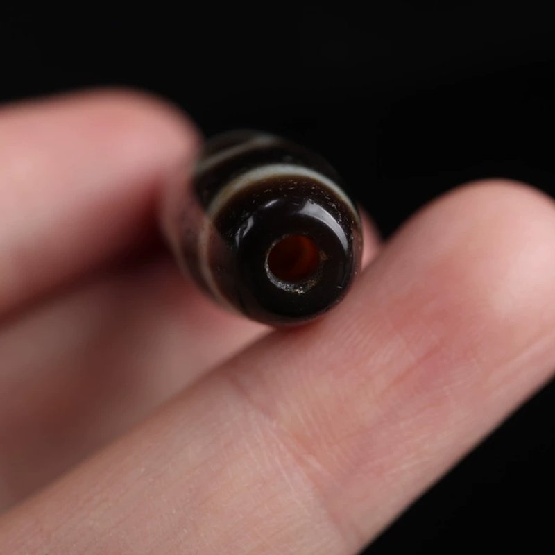 Perfecting Twofold Merit Talisman 2 Eye Dzi Bead