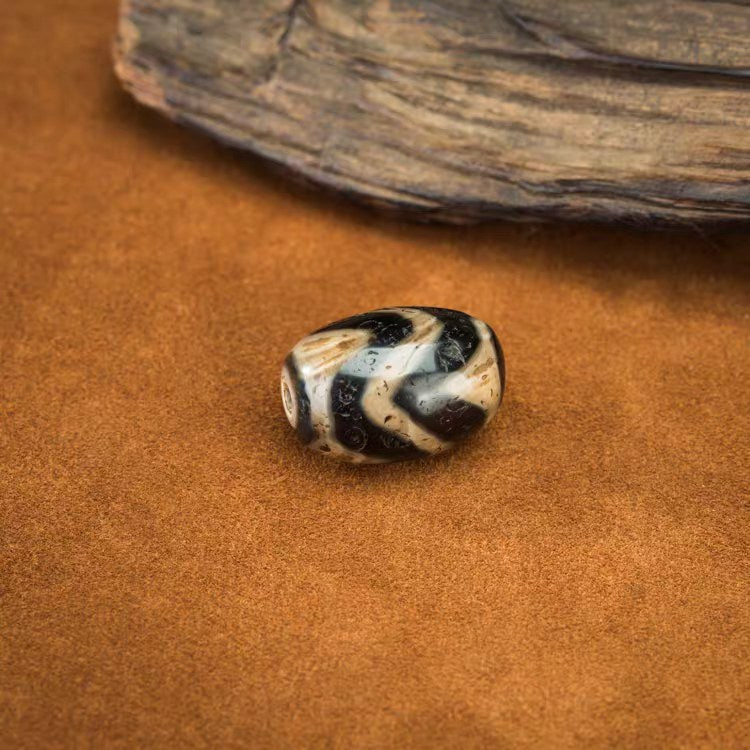 Vitality Rising Tiger Tooth Dzi Bead