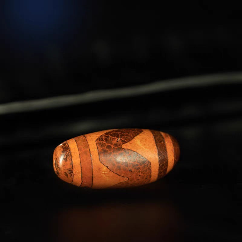 Shard of Unwavering Protection Tiger Tooth Dzi Bead